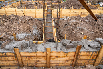 Pouring rubble concrete into the foundation