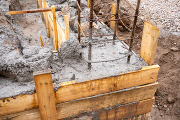 Pouring rubble concrete into the foundation