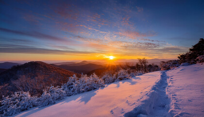 an amazing sunrise on a bitter cold morning along the snow covered appalachian trail in the blue ridge mountains