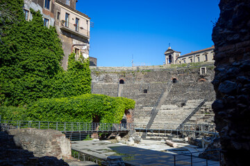 View of the remains and ruins of the Roman theatre in Catania, Sicily, Italy, with the stands and...
