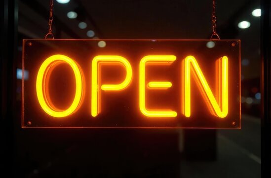 Neon sign "Open" on the door. Open store or bar.