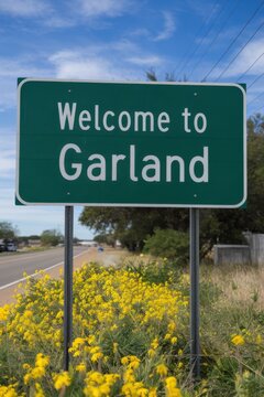 Welcome to Garland, Texas Sign with Yellow Flowers - Roadside Entrance to City in Dallas County, USA