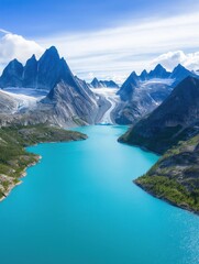 Naklejka premium Beautiful landscape of a mountain range with a large lake in the foreground. the lake is a deep turquoise color and is surrounded by lush green trees and shrubs.