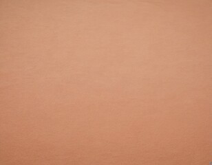 A smooth, warm peach-colored texture fills the frame, creating a serene and calming atmosphere.