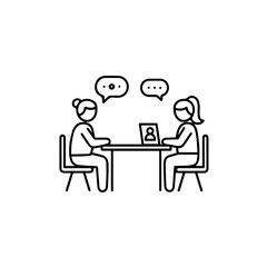 Two people discussing ideas at a table with a laptop background  