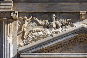 Relief on facade of Palace of Charles V, renaissance building inside fortress Alhambra, Granada, Spain, Andalusia