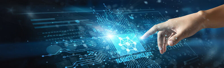 A businessman touches a nanotechnology icon, highlighting advanced microscopic innovations used in medicine, electronics, energy, and material science to enhance performance and precision.