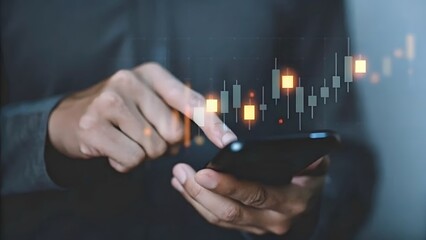 Stock Market Trading on Mobile Device with Digital Candlestick Chart &ndash; Fintech Investment Concept.