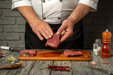 Chef skillfully prepares slices of fresh beef on a wooden cutting board, surrounded by spices, herbs, and a rustic kitchen backdrop, emphasizing the art of cooking