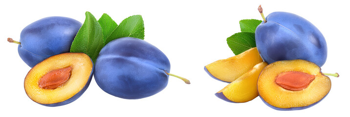 fresh plum and half with leaves isolated on white background