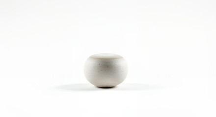 Light gray ceramic object against white background