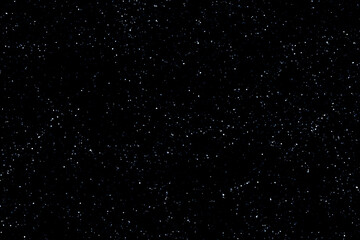 Starry night sky. Galaxy space background. Glowing stars in the night. Dark blue sky. New Year, Christmas and Celebration background concept.