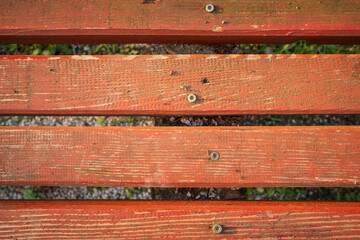 Close up on weathered painted wooden planks with screws Showing the texture and pattern