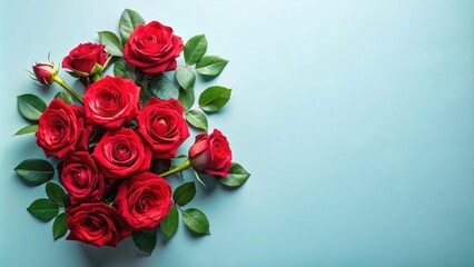 Obraz premium A vibrant cluster of deep red roses arranged on a light blue background, creating a captivating display of floral beauty and elegance.