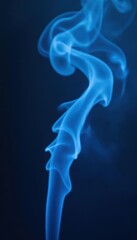 Obraz premium Abstract blue smoke stains on a dark background, ethereal and mystical , design, soft