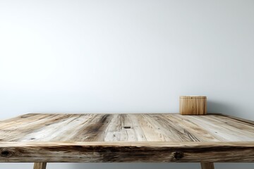Empty wooden table on a white wall background