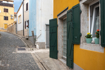 Colorful Alley with Shuttered Windows