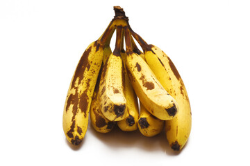 Over ripened Fresh bunch of bananas on white background
