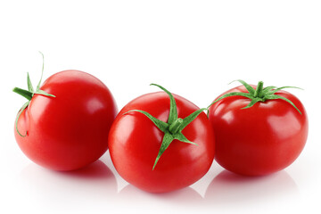 Fresh Tomatoes on the vine on white background