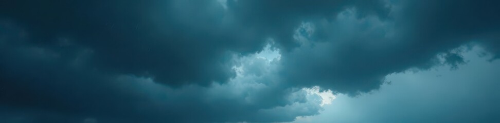 Ominous, dark grey storm clouds brewing, heavy with rain , abstract, climatic