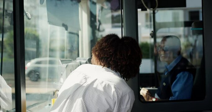 Bus stop, enter and back of woman in city pay ticket for journey, travel and morning commute. Public transport, passenger service and person boarding at station on vehicle for trip in urban town