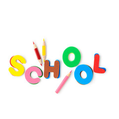 Colorful foam letters word SCHOOL isolated on white background. Clipping path.