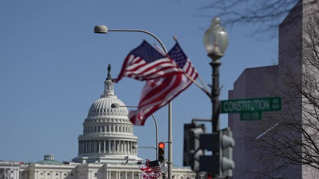 American construction flag waving. American construction at Capitol. Capitol in Washington DC. American construction site in Capitol. Construction and democracy in action. Vote and elect in America.