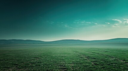 Obraz premium Vast, tranquil landscape bathed in teal hues.