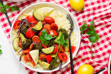 Couscous with assorted baked vegetables.selective focus