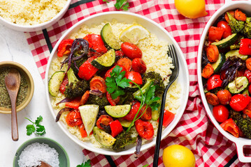 Couscous with assorted baked vegetables.selective focus