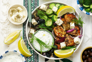 Greek Style Grilled Chicken and Quinoa Bowl with Yogurt Sauce