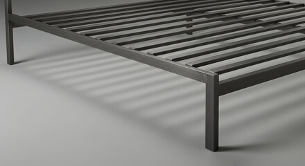 Minimalist Steel Bed Frame Structure Against Soft Grey Studio Background
