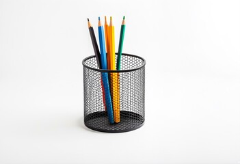 A black metal pen holder with two pencils in it.