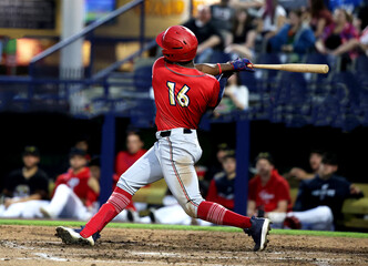 baseball player # 16 hitting