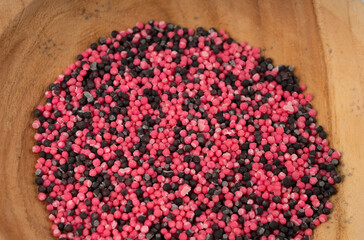 Candy sprinkle pile, round sugar sprinkles, small sweet color confectionery decoration balls