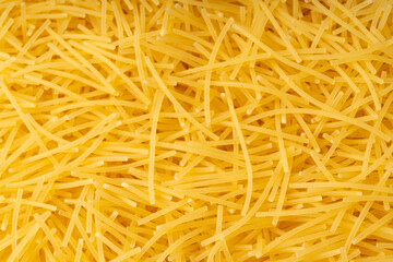 Raw vermicelli textured background, gold soup pasta pattern, small homemade noodles mock up