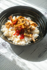 Soy sauce chicken rice on restaurant plate