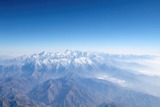 Snowy mountain range aerial view