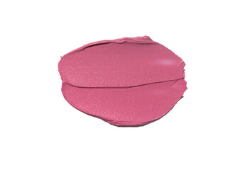 Pink purple berry lipstick smudged on a white isolated background texture. Make up beauty texture