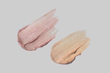 Liquid makeup concealer high lighter, lip balm or lipstick. Beauty texture swatch sample make up...