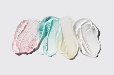 Cosmetic exfoliator serum or mask, moisturizer gel set assortment. Cica or aloe gel, butter, microcapsules, acids isolated on grey