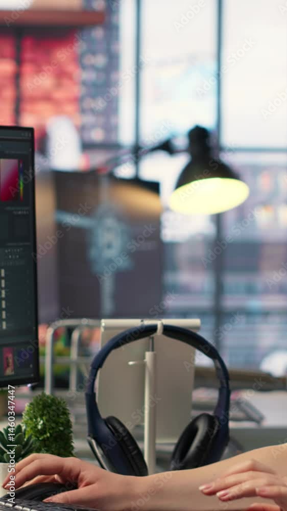Poster vertical video digital media expert working on photo editing with professional software at creative 