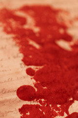  Red Ink Stains on Paper.Close-Up of Stained Manuscript with Red Ink.