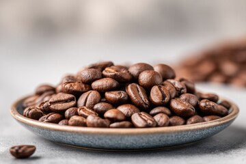 Naklejka premium Roasted coffee beans on plate
