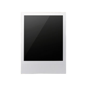Close-up of a classic white Polaroid instant photo against a neutral surface