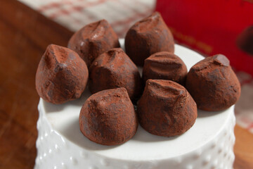 A view of several pieces of chocolate truffles.