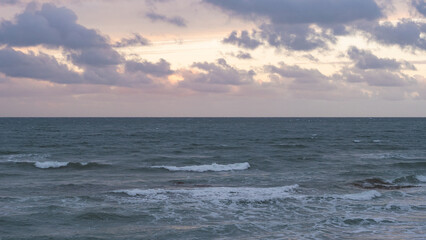 Late evening ocean stormy weather blue hour windy dunedin new zealand