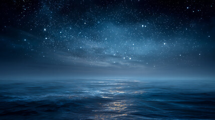 Fototapeta premium Starry night sky over blue ocean background with copy space image