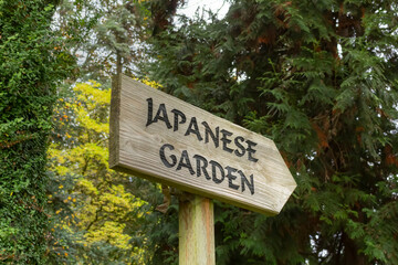 A view of a sign for a Japanese garden.