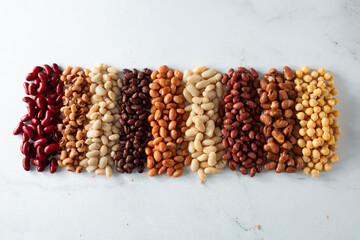 A top down view of organized rows of canned beans.
